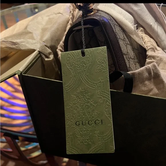 Like new Gucci purse. Only worn once. Receipt is in photos. - Picture 8 of 8
